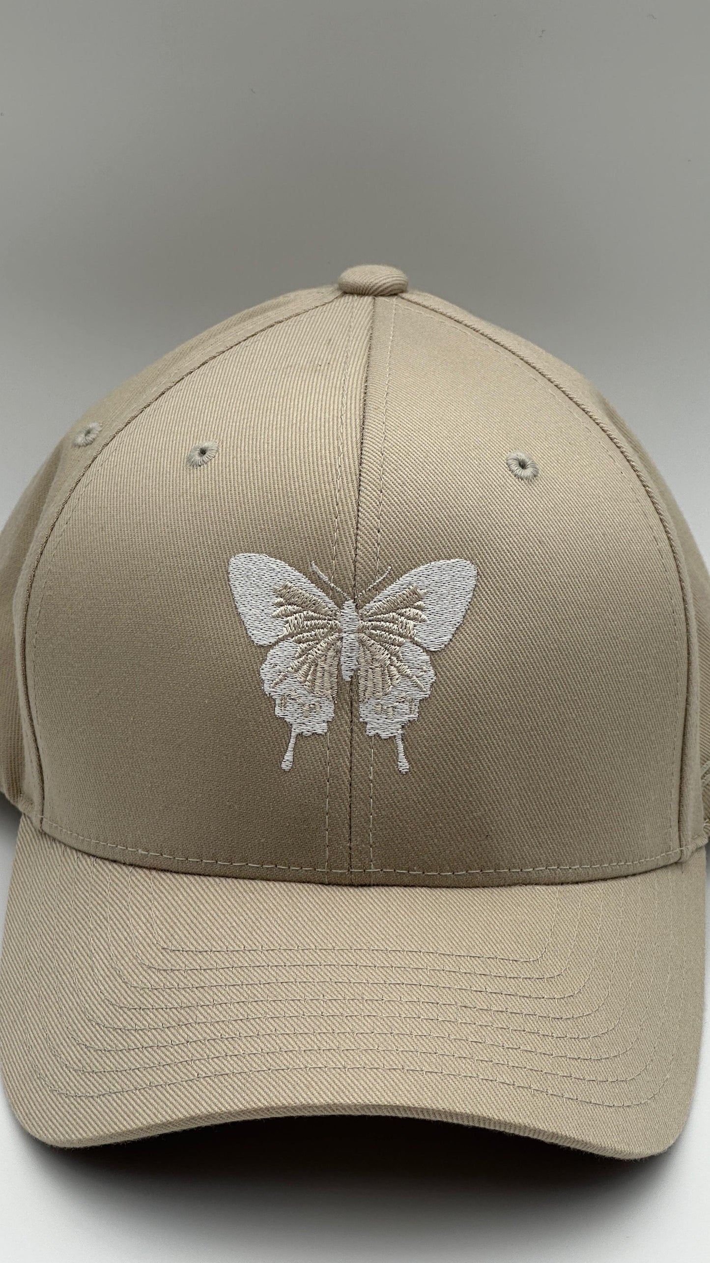 Butterfly Cap white on Brown